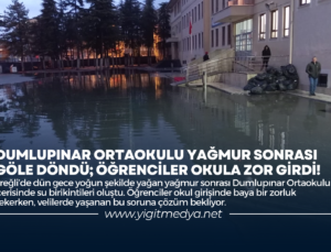 DUMLUPINAR ORTAOKULU YAĞMUR SONRASI GÖLE DÖNDÜ; ÖĞRENCİLER OKULA ZOR GİRDİ!